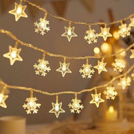 Luces LED para árbol de Navidad con forma de copo de nieve/estrella - 6 m/40 luces, luz blanca cálida, funcionan con 3 pilas AA EHD-LS05. (1/5)