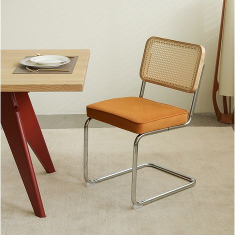 Silla de comedor de rattan, terciopelo naranja, estructura cromada, apilable (1/5)