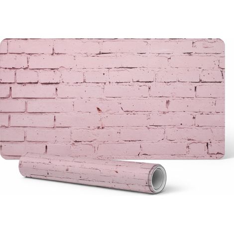 Alfombrilla protectora de escritorio con estampado de pared de ladrillos en tonos pastel, 90x45 cm.