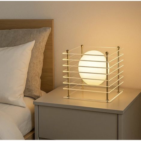 Lampada da tavolo di design con sfera opalina e struttura trasparente oro stile moderno contemporaneo, attacco G9 per casa e locali di interni