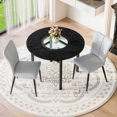 Ensemble table ronde 100 cm à plateau MDF noir avec 2 chaises rembourrées gris clair en PU et pieds en métal noir (1/5)