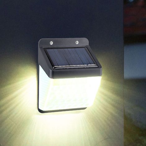 Aplique solar de pared con clasificación IP65, apto para iluminación exterior.
