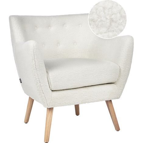 Sillón tapizado bouclé blanco con respaldo abotonado patas de madera Drammen
