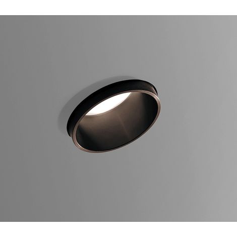 TECNICO Faretto da incasso in gesso con anello  metallico con finitura bronzo spazzolato. Portalampada GU10. Il faretto, installabile nel cartongesso, una volta rasato risulta parte unica con la strut