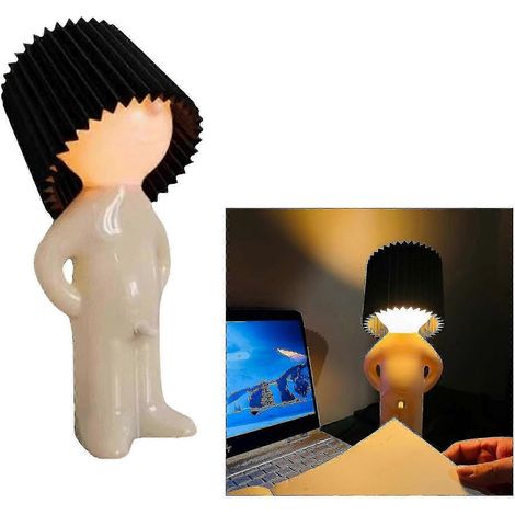 Lámpara de escritorio con un toque de humor, con la frase "Hombre creativo y tímido y niño travieso", ideal para decorar tu oficina en casa. (1/5)