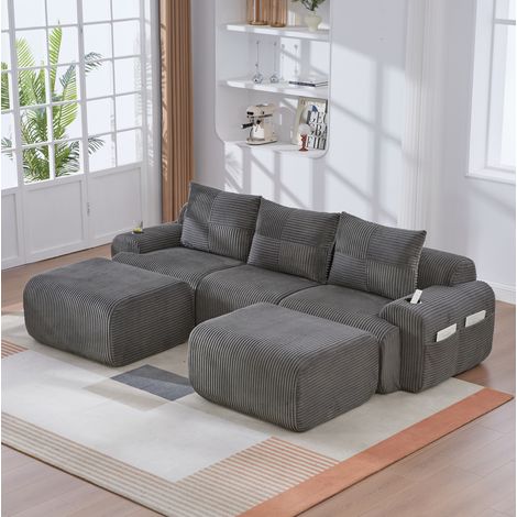Sofá modular 268/174/66 cm en gris oscuro con portavasos y bolsillo lateral (1/5)