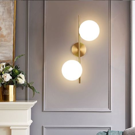 Applique da parete metallo oro con 2 sfere in vetro bianco attacco G9 lampada design moderno minimal (1/4)