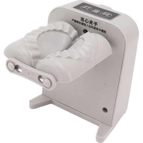 Machine automatique à moules à raviolis, équipée d'une cuillère et d'un pinceau, conception étanche, adaptée à un usage domestique et professionnel. (1/5)