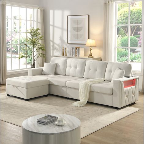 Sofá 4 plazas en L beige con puf de almacenaje, puertos USB y Type-C, luz LED multicolor y brazos con compartimentos para salón familiar amplio – CHICFURN (1/5)
