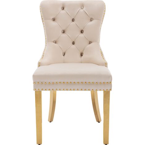 Sedia da pranzo imbottita in velluto beige con schienale decorativo e gambe in acciaio inox oro (1/5)