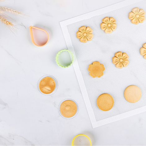 Tapis de cuisson en silicone perforé, respirant, isolant thermique et refroidissant, idéal pour les biscuits et le pain, grande taille. (1/5)