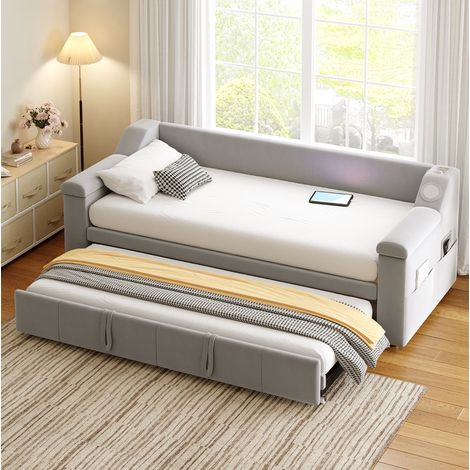 Divano letto 90x190/180x190 cm grigio chiaro in velluto con Bluetooth, USB e vani portaoggetti (1/5)
