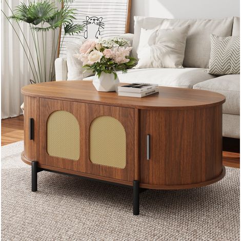 Mesa de centro ovalada de MDF color nogal con puertas de ratán y patas de metal negro, 100 cm (1/5)