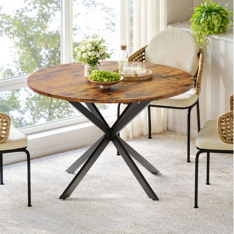 Mesa de comedor redonda industrial Ø120 cm, tablero efecto madera marrón, patas en X negras DESVIAE (1/5)
