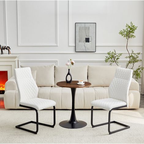 Conjunto de mesa redonda de 60 cm y 2 sillas en MDF, PU blanco y metal negro (1/5)