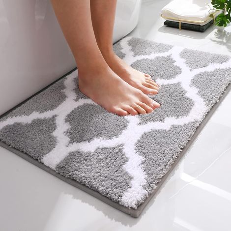 Tapis de salle de bain en microfibre douce et absorbante, antidérapant, à poils longs. (1/3)