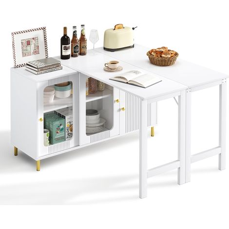 Buffet blanc moderne avec plateau rabattable et extensible, surface pivotante, pieds en métal doré, portes coulissantes en verre et motif ondulé – idéal pour la salle à manger et la cuisine