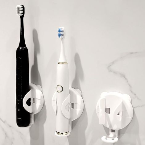 Juego de 3 soportes adhesivos de pared para cepillos de dientes con sensor de gravedad automático y fijación reforzada.