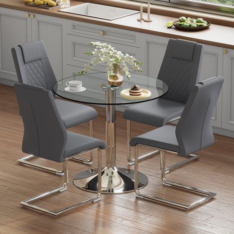 Set da pranzo con tavolo rotondo (Ø85 cm) con piano in vetro trasparente + 4 sedie in similpelle grigio scuro con gambe in metallo argentato