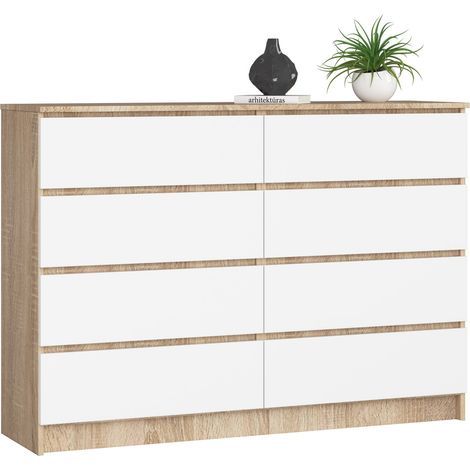 Cómoda AKORD K140 Roble Sonoma 138 cm 8 cajones frente en color Blanco 138x40x99 cm (1/5)