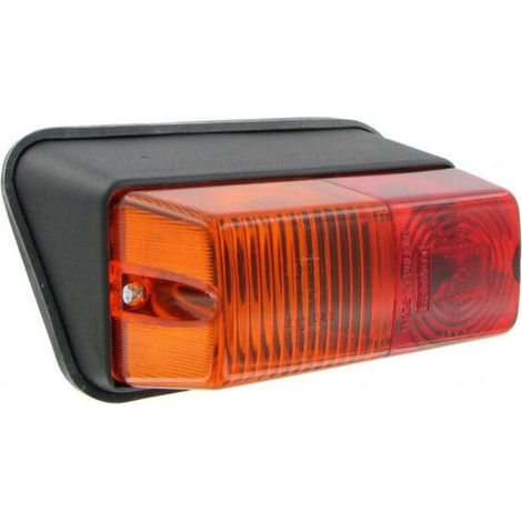 Luz trasera multifuncional para tractor URSUS: luz de posición, intermitente y luz de freno. Dimensiones: 156 x 72 x 98 mm. Montaje en ángulo.