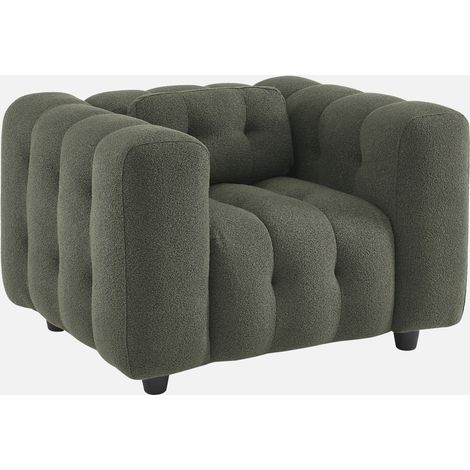 Sillón tapizado en tejido borreguito