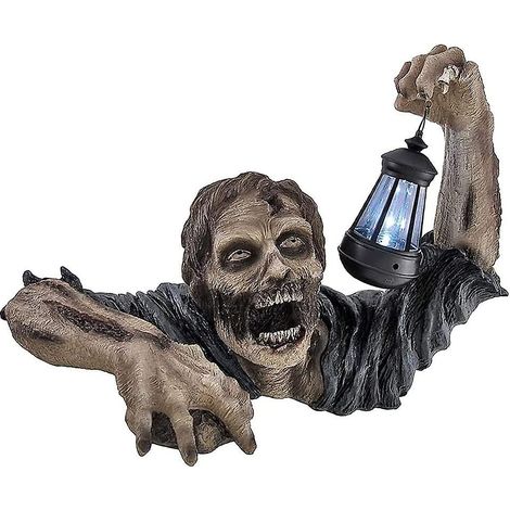 Statue décorative d'Halloween représentant un zombie rampant avec une lanterne LED (1/5)