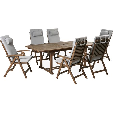 Conjunto de comedor exterior rústico 6 plazas mesa extensible sillas reclinables madera acacia oscura con cojines gris claro Amantea Premium