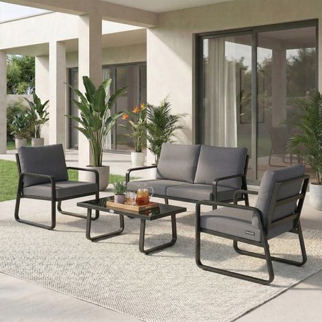 Set di mobili da giardino composto da 4 pezzi con cuscini rimovibili extra spessi da 10 cm e tavolino da caffè in vetro temperato nero.