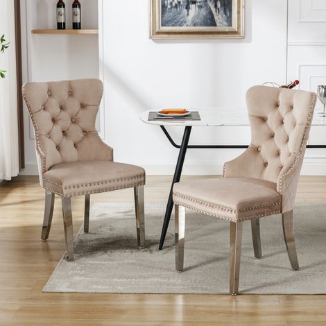 Lot de 2 chaises de salle à manger velours beige,dossier décoré,clouté,pieds métalliques,design chic et confortable.