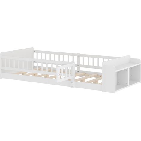 Cama infantil 90 x 200 cm de pino blanco con almacenaje abierto y barrera abatible HOMVRA (1/5)
