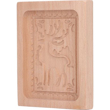 Emporte-pièce en bois sculpté, forme d'élan, pour pain d'épice ou autre objet de cuisine. (1/5)