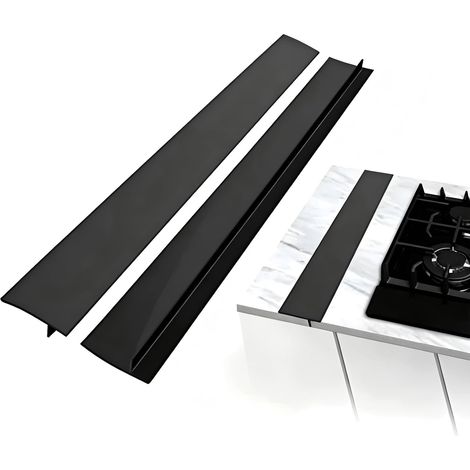 Deux couvre-fentes en silicone (63,5 cm) pour l'espace entre la cuisinière et le plan de travail conviennent comme bandes de jonction pour plans de travail et fours. (1/5)