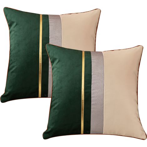 Housse de coussin patchwork bleu marine avec taie d'oreiller à rayures dorées, style moderne et luxueux (1/5)