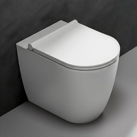 Vaso filomuro traslato bianco opaco con sedile soft close di Ceramica Dolomite Mayka (1/5)