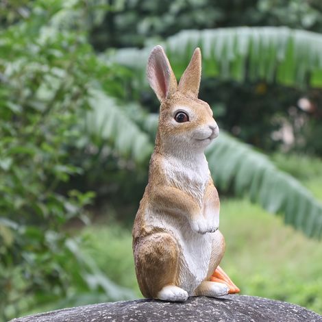Un lièvre debout, un ornement de jardin, une décoration de coin pour plantes et une statue de jardin. (1/5)