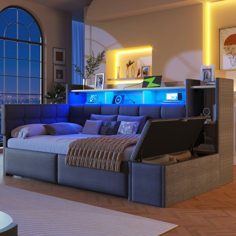 Ce canapé-lit de 90 x 190 cm est équipé de deux tiroirs, de ports USB et Type-C, d'un espace de rangement et d'un repose-pieds. Il comprend également une bande lumineuse LED. Matelas non inclus. (1/5)