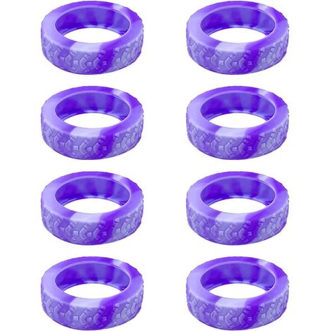 Huit protections de roues en silicone résistant pour prolonger la durée de vie de vos valises. Fabriquées en polyuréthane violet et clair. (1/5)