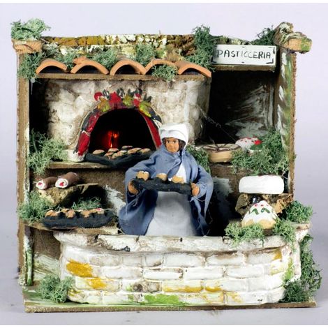 11334 Pasticciere a movimento e luce eff.fiamma cm. 20x14x18 - PERSONAGGIO PRESEPE NATALE