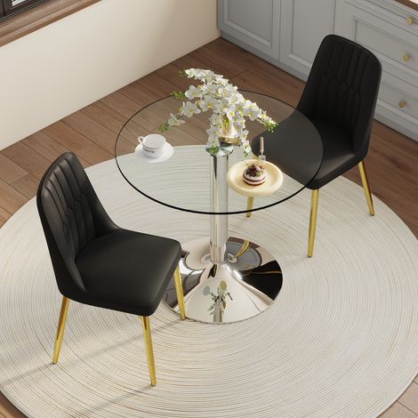 Table verre 85cm avec 2 chaises PU noires et pieds dorés,style minimaliste pratique pour équiper salle à manger et cuisine.