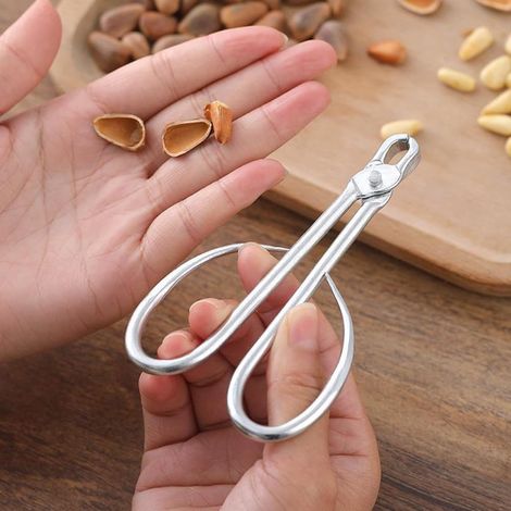 Calibrador, nueces sin cáscara, pelador manual de melón, pelador de pistachos, extractor de nueces resistente para uso diario, abrelatas de acero inoxidable (1/5)