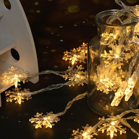 Guirlande lumineuse à 50 LED en forme de flocon de neige, à suspendre à la maison, pour décorer une commode ou une fête. (1/5)