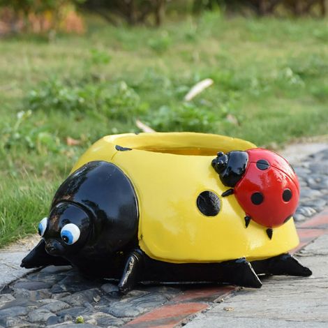 Coccinelle jaune décorative pour pot de fleurs (1/4)