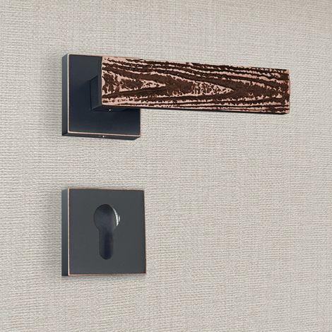Poignée de porte design à cylindre finition aspect cuivre patiné noir Flora - KATCHMEE