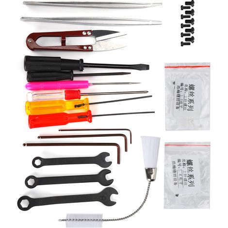 Kit pour surjeteuse comprenant : pinces droites/courbes, clés, tournevis cruciforme/plat, vis, brosse et ciseaux, avec boîte de rangement. (1/5)