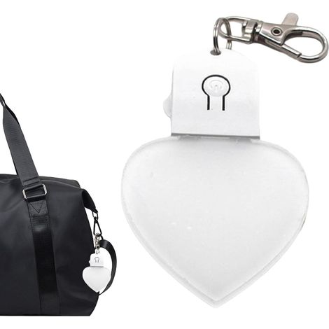 Linterna LED ligera con forma de corazón para cartera (1/5)