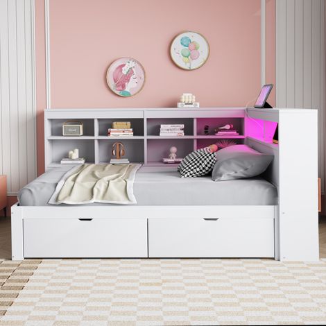 Canapé-lit multifonction en bois massif blanc 90x200 cm, avec rangements intégrés, prises USB, prise électrique et bande LED, étagères et niches, grand espace de stockage.