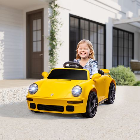 Auto elettrica per bambini, auto per bambini 12V con telecomando, avviamento graduale, lettore MP3, luci a LED, clacson, indicatore di energia, gialla