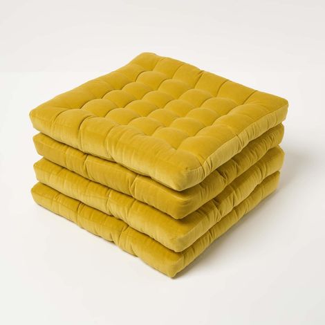 HOMESCAPES Set of 4 Mustard Yellow Quilted Velvet Chair Pad, 40 x 40 cm
