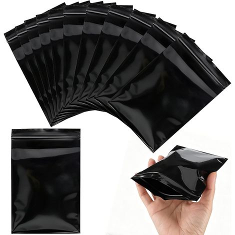 Lot de 100 sachets hygiéniques pour serviettes hygiéniques  10 cm x 15 cm - Épais - Noir féminin - Pour tampons - Pour le quotidien (1/5)